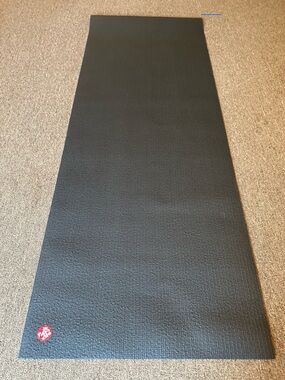 Manduka Black Yoga Mat with Red Logo